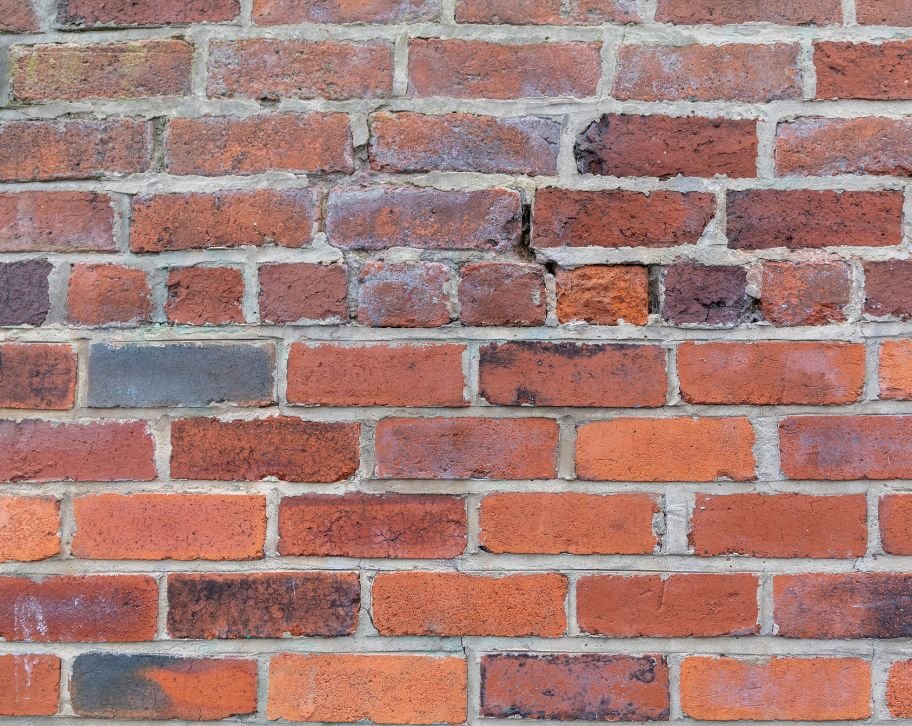 How to repair mortar cracks in brick wall?