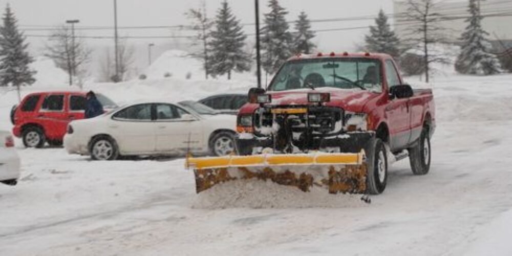 Steps to Protect Your Driveway and Landscaping During Snow Plowing