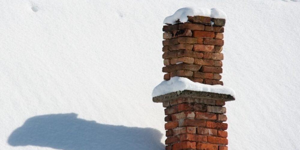 How does freezing and thawing affect a brick chimney?